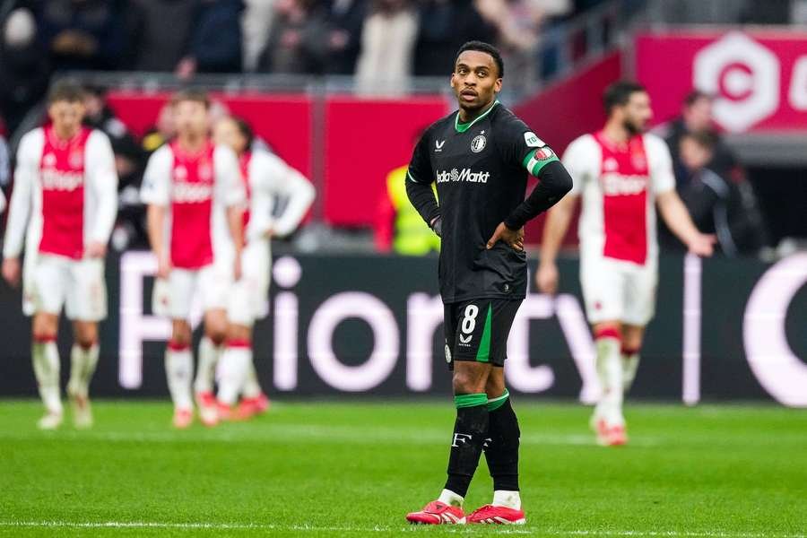 Feyenoord captain Quinten Timber looks distraught after conceding a late goal