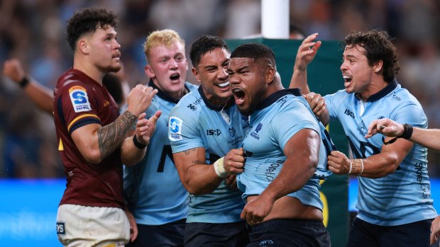 Siosifa Amone of the Waratahs celebrates the match winning try.