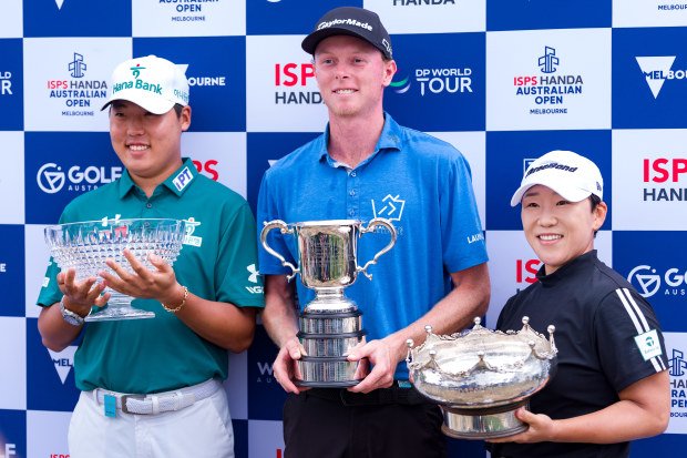 Simon Seungmin Lee of Republic of Korea poses with the All Abilities Champion trophy, Ryggs Johnston of the United States poses with the Stonehaven Cup and Jiyai Shin of Republic of Korea poses with the Patricia Bridges Bowl after victory on day four of the ISPS Handa Australian Open 2024 at Kingston Heath Golf Club on December 01, 2024 in Melbourne, Australia. (Photo by Andy Cheung/Getty Images)