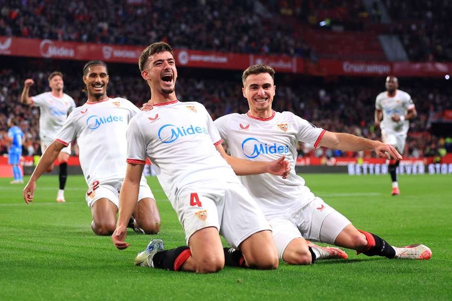 Kike Salas of Sevilla celebrates scoring the opening goal