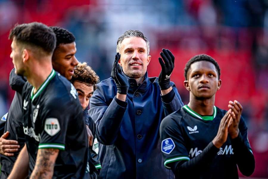 Feyenoord manager Robin van Persie applauds the away fans after his side's 6-2 win Feyenoord manager Robin van Persie applauds the away fans after his side's 6-2 win