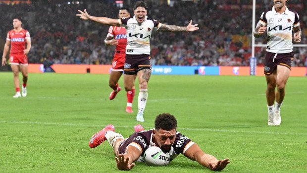 Gehamat Shibasaki scores a try during the round four NRL match between the Dolphins and the Broncos.
