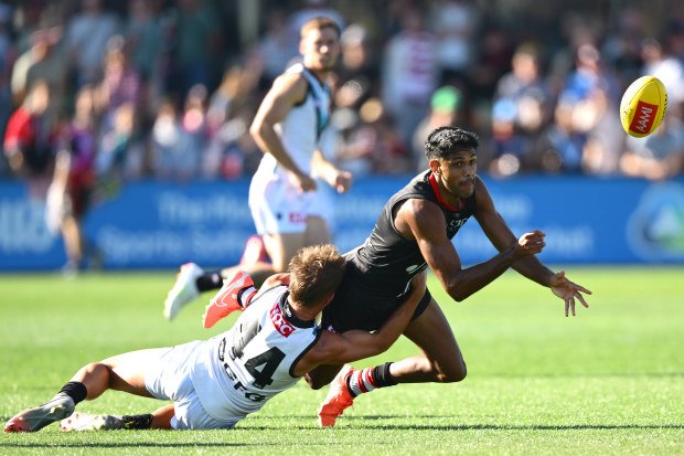 Nasiah Wanganeen-Milera delivers a handball during St Kilda's practice match against Port Adelaide.