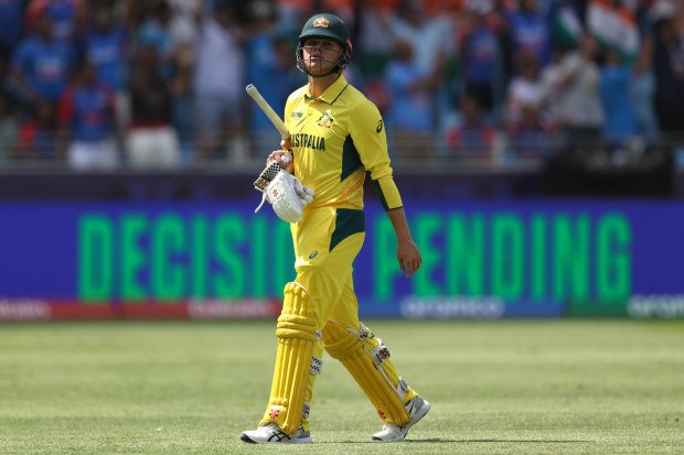 Cooper Connolly leaves the field after his dismissal.