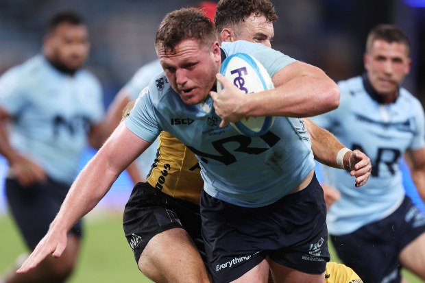 Angus Bell of the Waratahs with the ball.