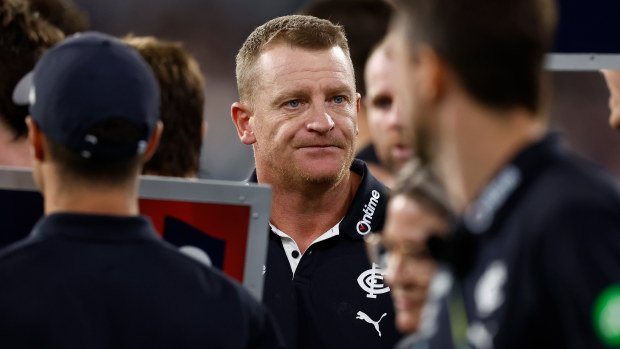 Michael Voss observing the game against the Western Bulldogs.