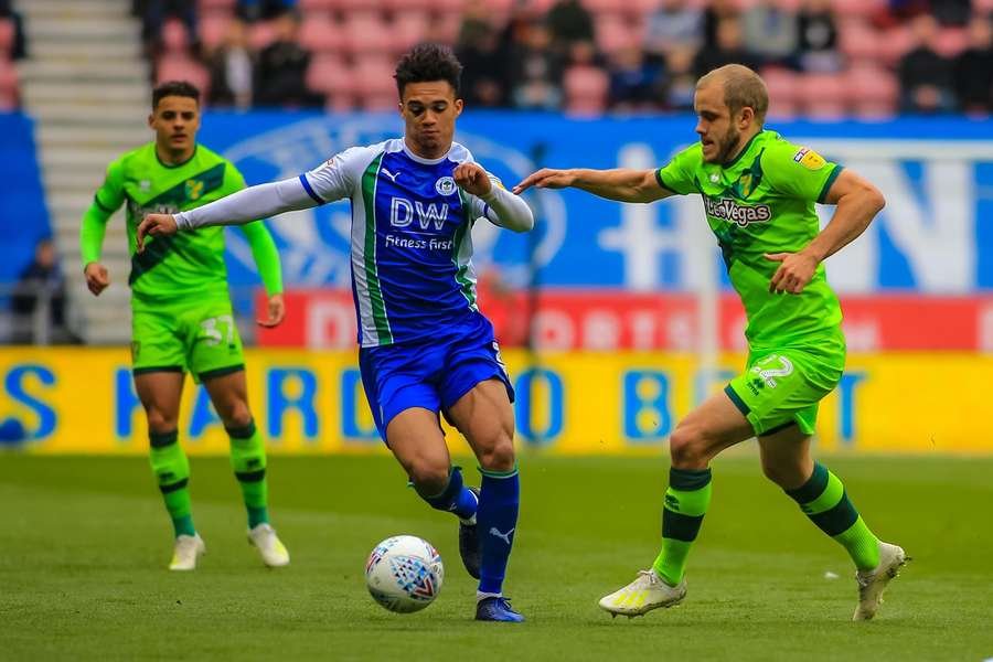 Robinson resists pressure from Norwich's Teemu Pukki in 2019 Robinson resists pressure from Norwich's Teemu Pukki in 2019