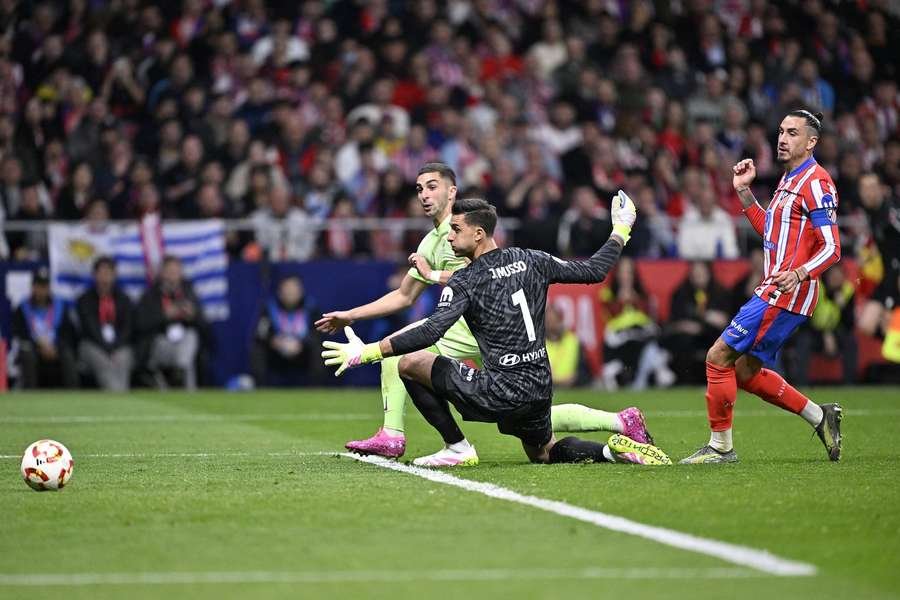Barcelona's Ferran Torres scores the winning goal past Atletico Madrid goalkeeper, Juan Musso, during the Copa del Rey Semi Final second leg match Barcelona's Ferran Torres scores the winning goal past Atletico Madrid goalkeeper, Juan Musso, during the Copa del Rey Semi Final second leg match