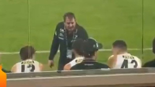 Saints coach Ross Lyon chastises Hugo Garcia on the bench.