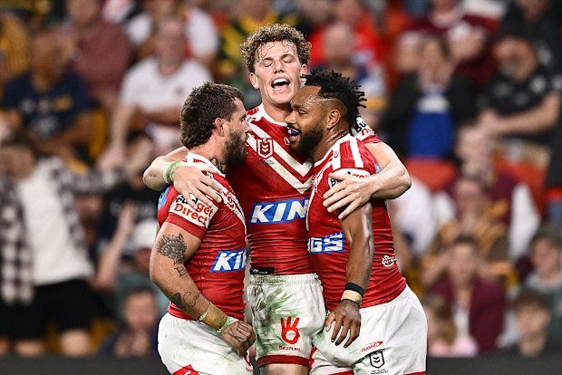 Hamiso Tabuai-Fidow celebrates scoring a try for the Dolphins.