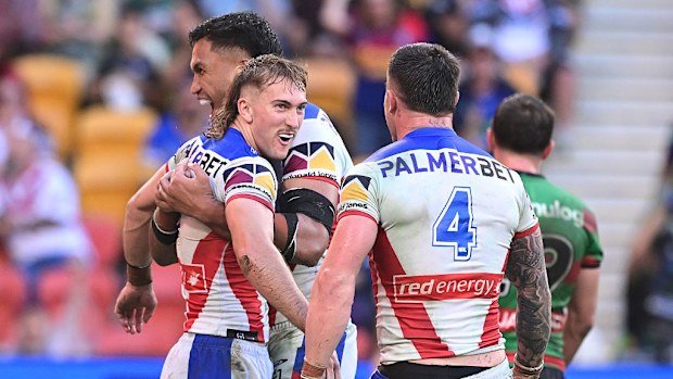 Fletcher Sharpe celebrates scoring his third try against the Rabbitohs.