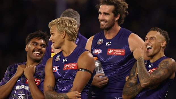 Isaiah Dudley, Quinton Narkle, Alex Pearce and Shai Bolton of the Dockers look on after winning the round seven AFL match between Fremantle Dockers and Adelaide Crows.