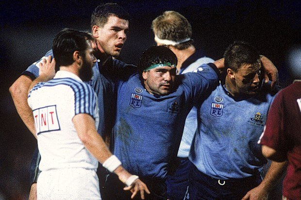 Benny Elias (centre) in action for the Blues in 1990.