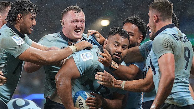 Taniela Tupou of the Waratahs celebrates scoring his team's third try.