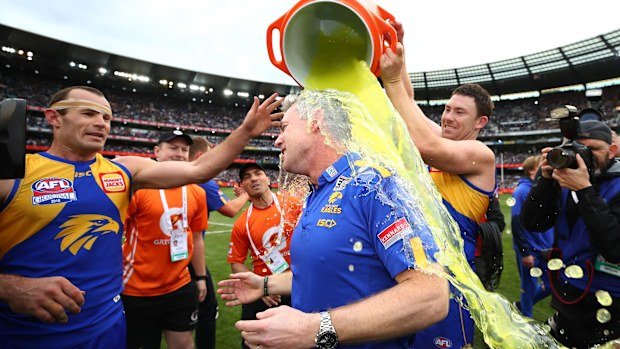 McGovern dousing coach Adam Simpson with Gatorade after the 2018 grand final.