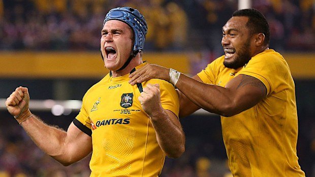 James Horwill and Sekope Kepu celebrate beating the Lions in Melbourne.