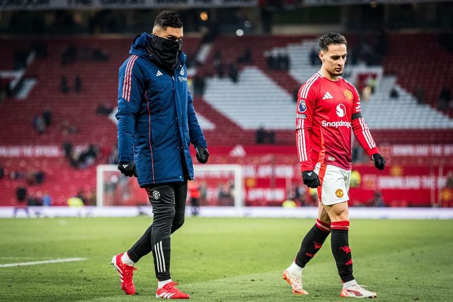 Manchester United's Antony and Casemiro leave the pitch disappointed after losing 1-3 against Brighton Manchester United's Antony and Casemiro leave the pitch disappointed after losing 1-3 against Brighton