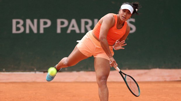 Australia's Destanee Aiava serves against Dayana Yastremska in their first-round match.