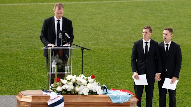 Adam Selwood speaks at his twin brother Troy's funeral in February.