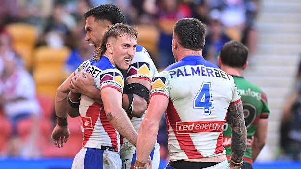Fletcher Sharpe celebrates scoring his third try against the Rabbitohs.
