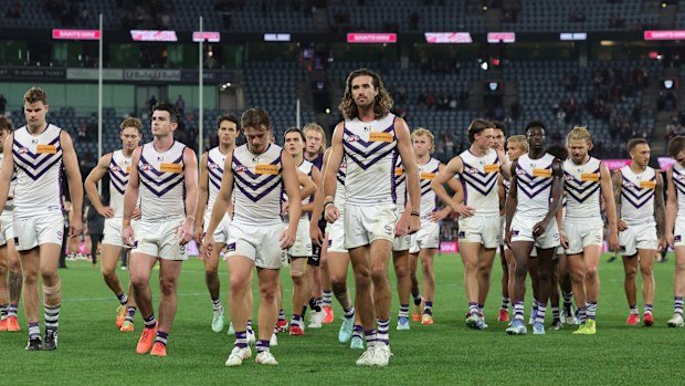 Fremantle players leaving the field after their 61-point loss to St Kilda in round eight of the 2025 AFL season.