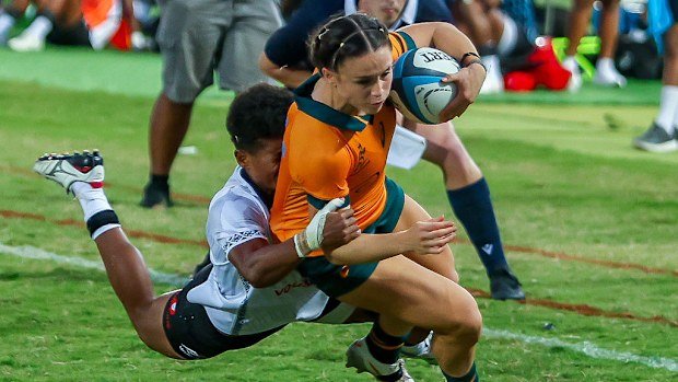 Desiree Miller of Australia on her way to scoring a try.