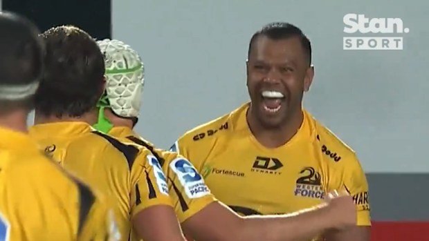 Kurtley Beale celebrates a try.