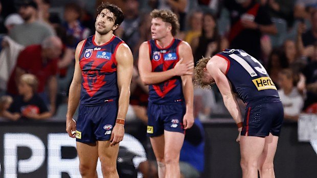 ADELAIDE, AUSTRALIA - APRIL 12: Christian Petracca (left) and Clayton Oliver of the Demons react as the final siren sounds during the 2025 AFL Round 05 match between the Melbourne Demons and the Essendon Bombers at Adelaide Oval on April 12, 2025 in Adelaide, Australia. (Photo by Michael Willson/AFL Photos via Getty Images)
