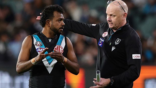 Willie Rioli with Port Adelaide coach Ken Hinkley.