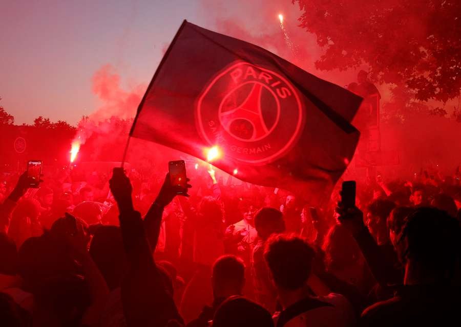 PSG fans celebrate their first goal in Place de Saint-Cloud PSG fans celebrate their first goal in Place de Saint-Cloud