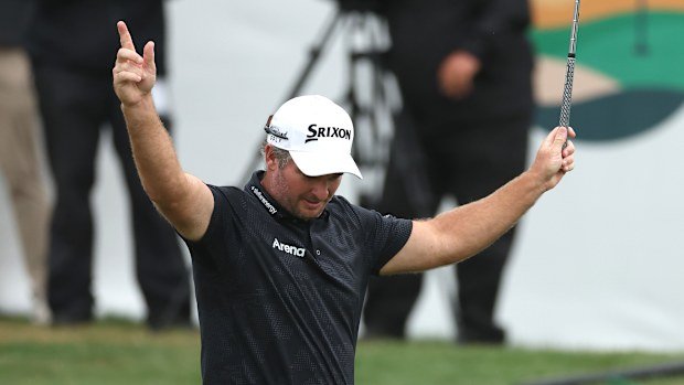 Ryan Fox of New Zealand reacts after chipping in on the 18th green during the first playoff hole to win the final round of the ONEflight Myrtle Beach Classic 2025 at Dunes Golf & Beach Club on May 11, 2025 in Myrtle Beach, South Carolina. (Photo by Andy Lyons/Getty Images)