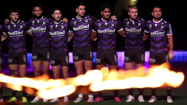 The Storm pose together during an ANZAC Day ceremony prior to the round eight NRL match between the Melbourne Storm and South Sydney Rabbitohs at AAMI Park on April 25, 2025, in Melbourne, Australia. (Photo by Robert Cianflone/Getty Images)