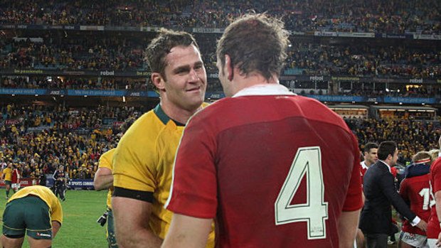 James Horwill and Alun Wyn Jones shake hands.