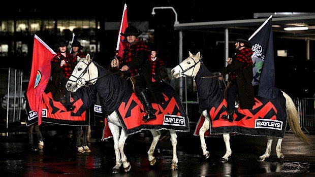 Horsemen wait at Apollo Projects Stadium.