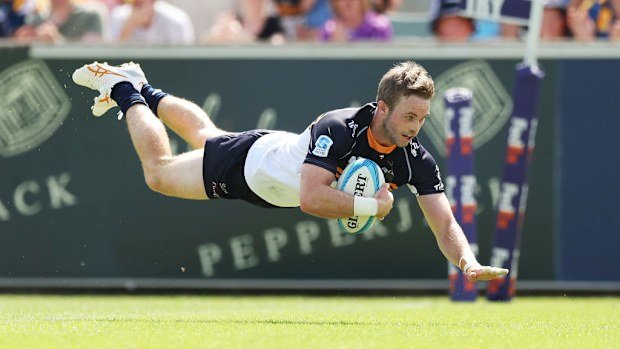 Ryan Lonergan of the Brumbies scores a try.