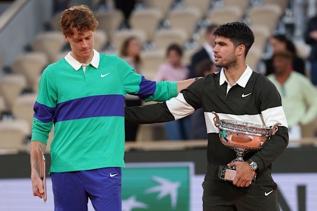 Carlos Alcaraz of Spain (right) and Jannik Sinner after the final.