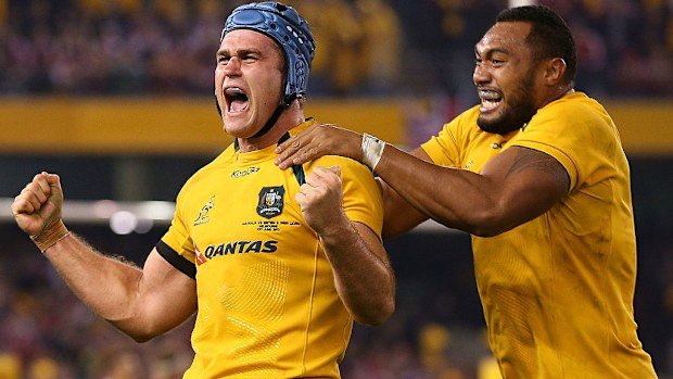 James Horwill and Sekope Kepu celebrate beating the Lions in Melbourne.