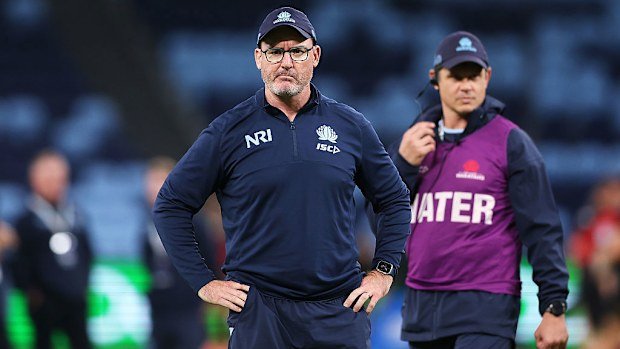 Waratahs coach Dan McKellar watches on.