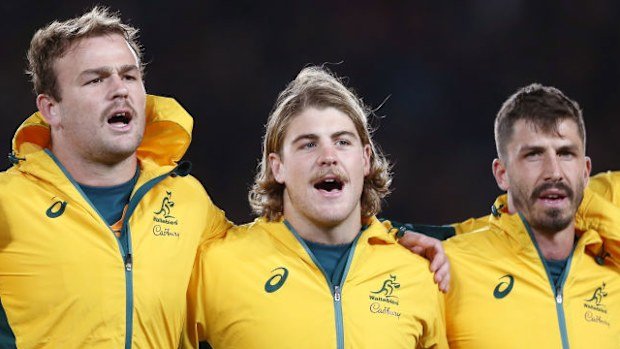 Wallabies players including Harry Wilson, Fraser McReight, Jake Gordon and Darcy Swain during the national anthem.