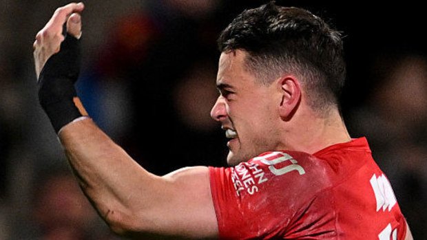 Will Jordan of the Crusaders celebrates after scoring a try.