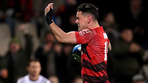 Will Jordan of the Crusaders celebrates after scoring a try.