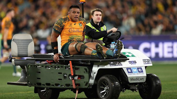 Allan Alaalatoa of the Wallabies leaves the field injured.