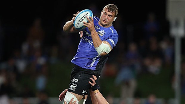 Nick Champion de Crespigny of the Force wins a lineout.