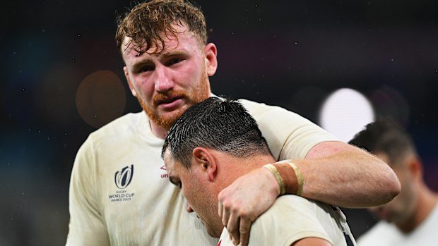 Ollie Chessum of England consoles Jamie George.