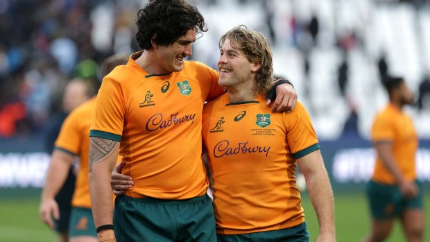Darcy Swain and Michael Hooper of Australia celebrate victory.