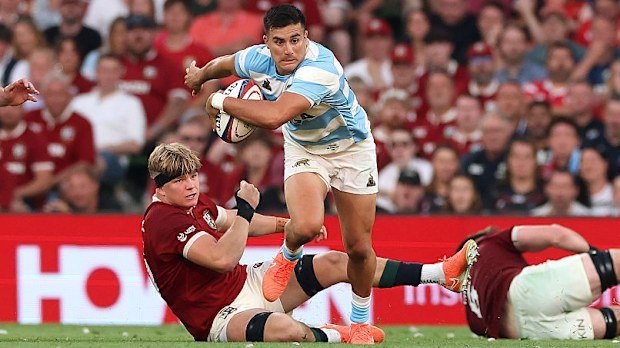 Tomas Albornoz of Argentina breaks clear of Henry Pollock.