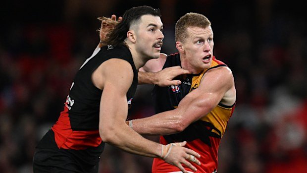 Sam Draper of the Bombers and Reilly O'Brien of the Crows.