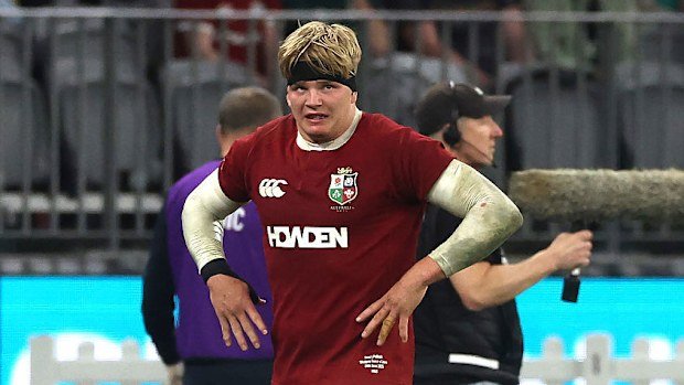 Henry Pollock of the British & Irish Lions walks off the field after being shown a yellow card.