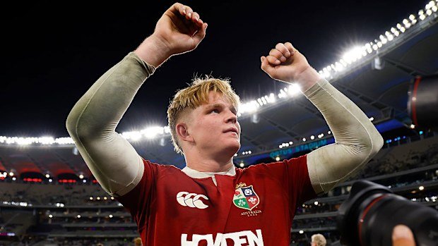 Henry Pollock of the Lions acknowledges the crowd at Optus Stadium.