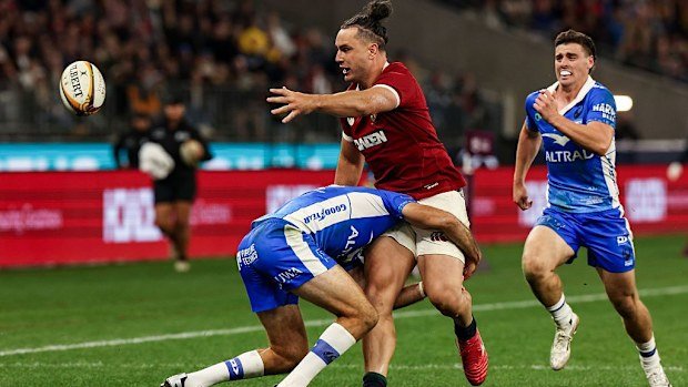 James Lowe of British & Irish Lions offloads on the way to setting up his side's fourth try.